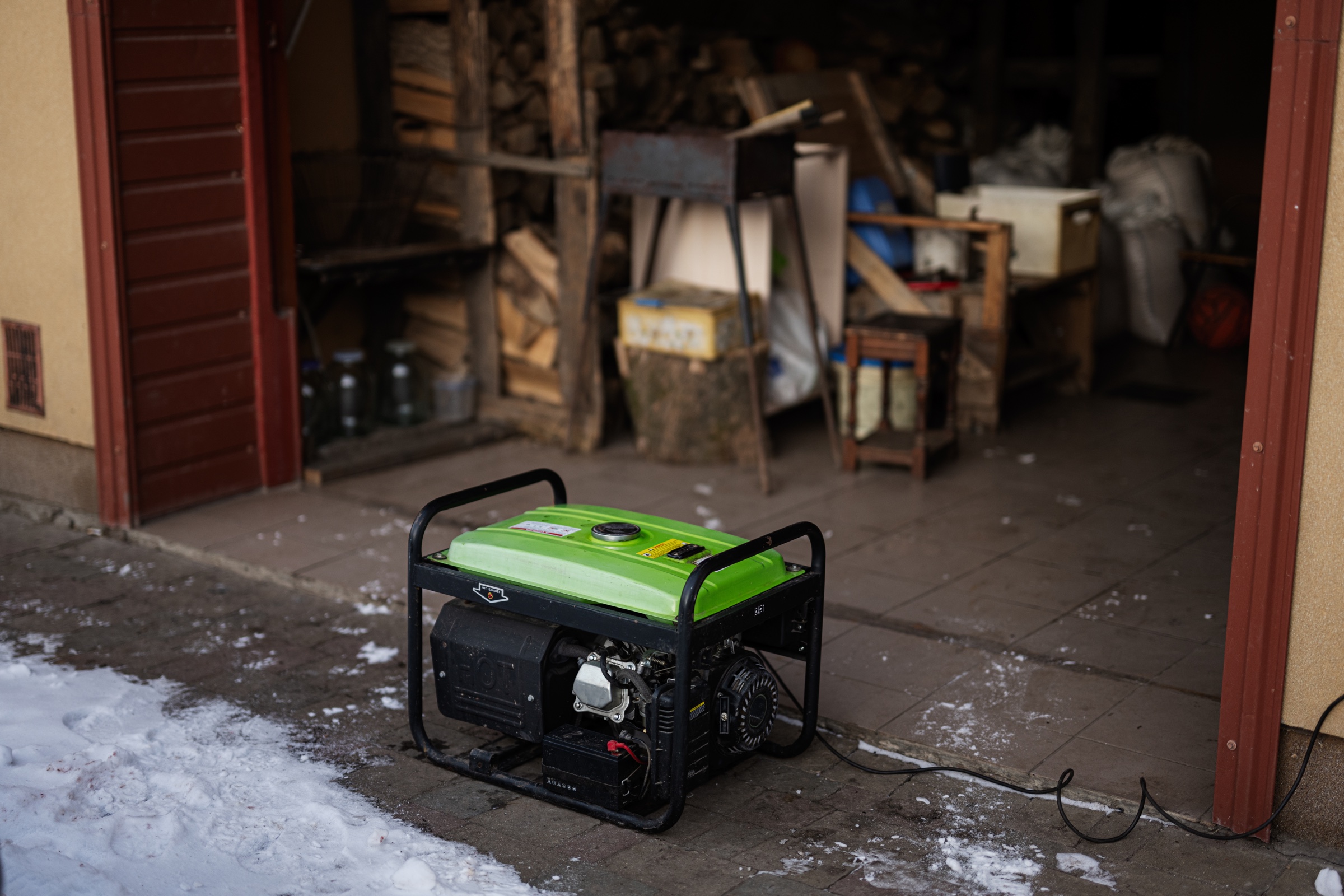 An open-frame portable generator positioned outdoors