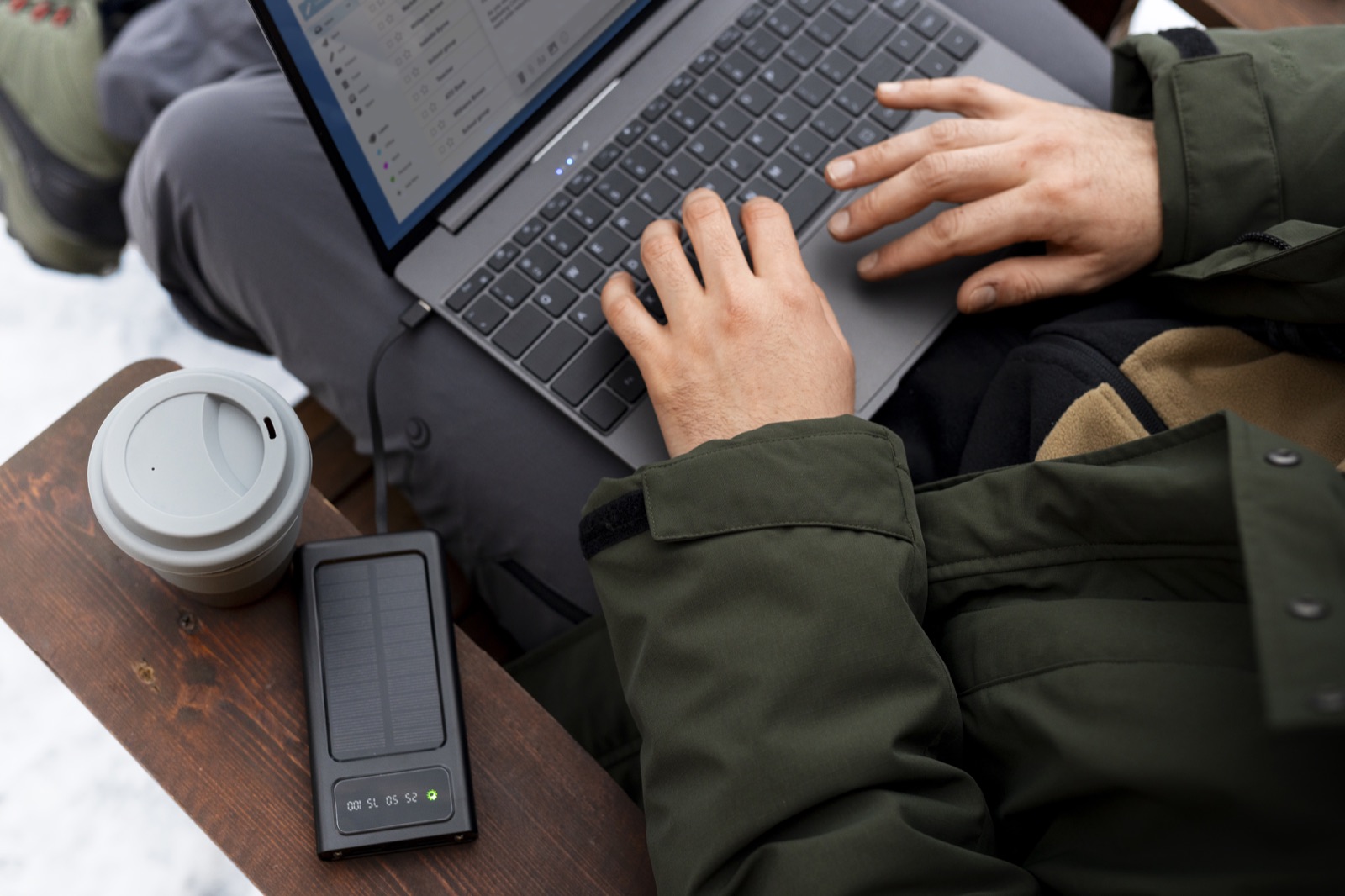 Laptop and portable battery used while working away from an outlet
