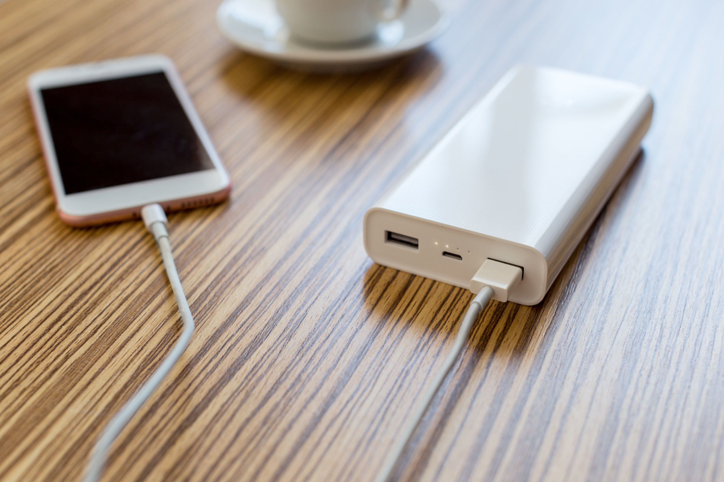 A power bank and phone ready for a like-for-like comparison