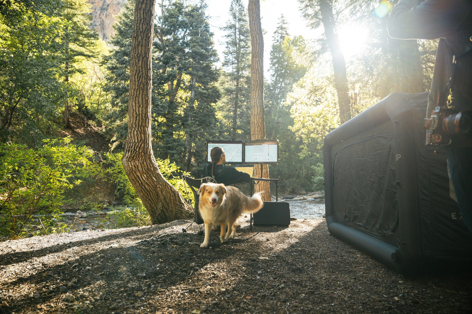 A remote workstation beside a forest stream